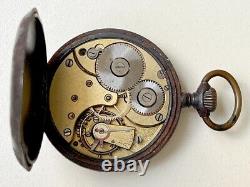 1920's OMEGA GUN METAL POCKET WATCH FOR PARTS OR REPAIR runs & stop