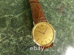Baume & Mercier 14k solid gold quartz watch not working sold for part /repair