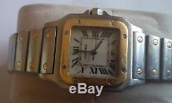 Cartier santos quartz mens watch. Stainless steel and gold. Not working