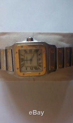 Cartier santos quartz mens watch. Stainless steel and gold. Not working