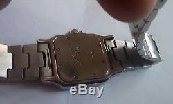 Cartier santos quartz mens watch. Stainless steel and gold. Not working