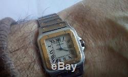 Cartier santos quartz mens watch. Stainless steel and gold. Not working