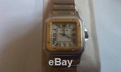 Cartier santos quartz mens watch. Stainless steel and gold. Not working