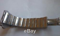 Cartier santos quartz mens watch. Stainless steel and gold. Not working