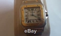 Cartier santos quartz mens watch. Stainless steel and gold. Not working