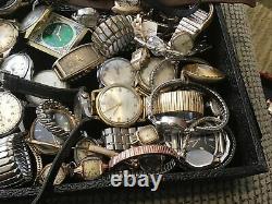 Large group of vintage mechanical watches for parts or repair