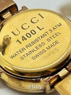 Read Gucci 1400L Watch Ladies Round Quartz Gold Pink Not tested For Parts