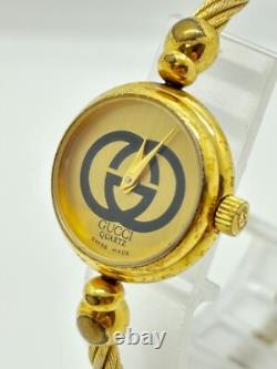 Read Gucci 2047L Gold Dial Gold Cable Bangle Watch Not tested For Parts F/S