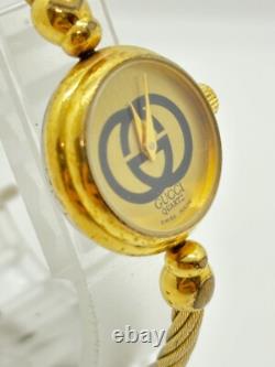 Read Gucci 2047L Gold Dial Gold Cable Bangle Watch Not tested For Parts F/S