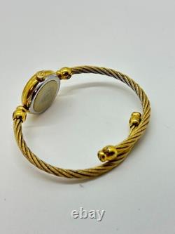 Read Gucci 2047L Gold Dial Gold Cable Bangle Watch Not tested For Parts F/S