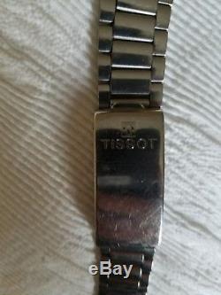 Tissot T 12 for parts not running includes bracelet mens womans for repair watch